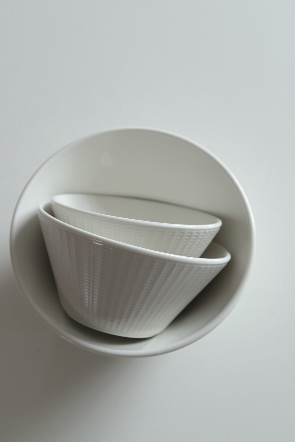 Three stacking bowls white