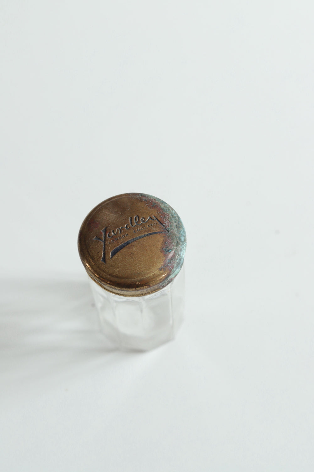 Vintage bottle with original brass lid