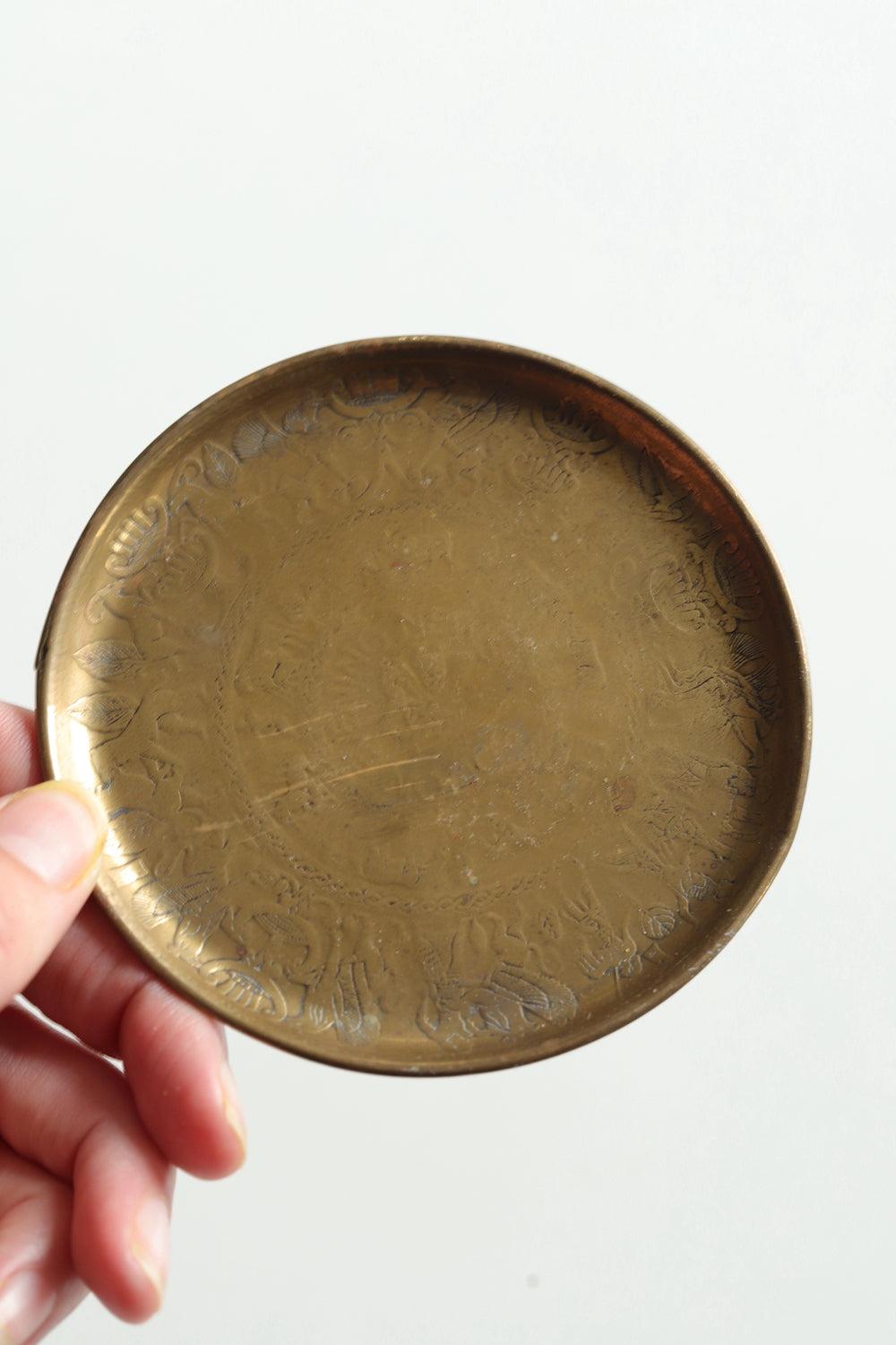 Small round brass plate